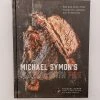 Penguin Random House Michael Symon's Playing With Fire: BBQ And More From The Grill, Smoker, And Fireplace: A Cookbook